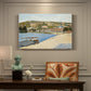 Canvas art print featuring a riverside with buildings and flowing water, presented within a refined interior setting