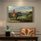 Canvas art print featuring a mounted hunter with dogs pursuing game across open landscape, presented within a refined interior setting