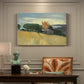 Canvas art print featuring a golden wheat field stretching across a sunlit landscape under open sky, presented within a refined interior setting