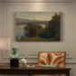 Canvas art print featuring a lake surrounded by hills with reflective water and open sky, presented within a refined interior setting