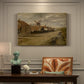 Canvas art print featuring a mill building beside water in quiet rural landscape, presented within a refined interior setting