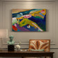 Canvas art print featuring a simplified mountain village scene with church and surrounding hills in bold color, presented within a refined interior setting