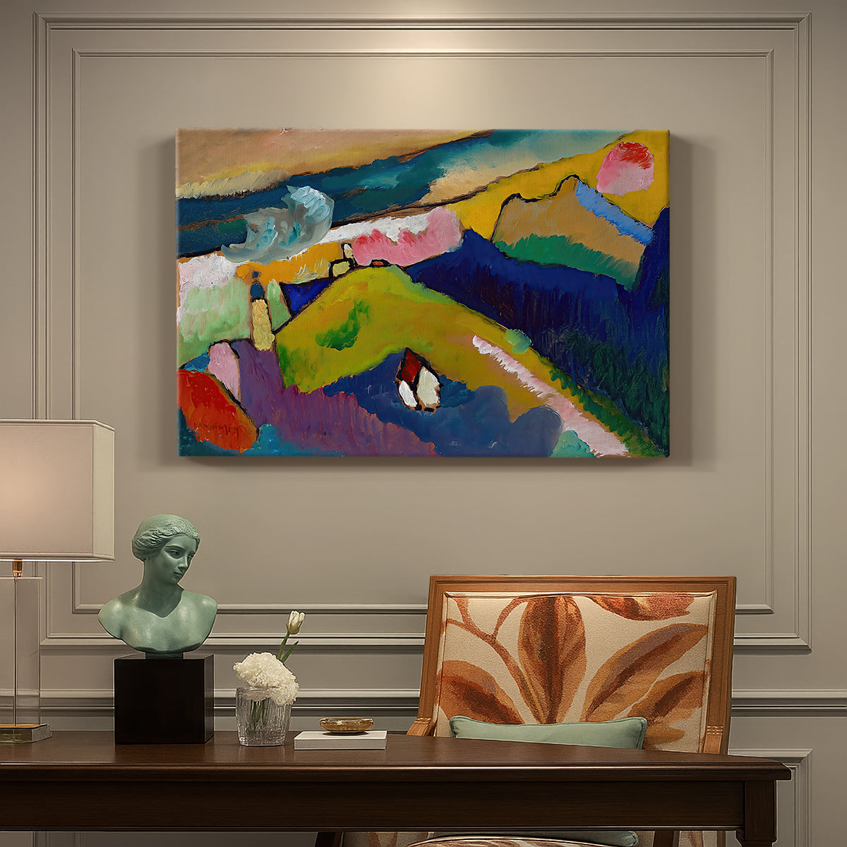 Canvas art print featuring a simplified mountain village scene with church and surrounding hills in bold color, presented within a refined interior setting