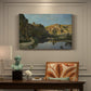 Canvas art print featuring a river flowing between rocky cliffs under open sky, presented within a refined interior setting