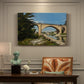 Canvas art print featuring an arched bridge spanning river with structure reflected in water, presented within a refined interior setting