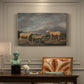 Canvas art print featuring a group of sheep standing together in open pasture, presented within a refined interior setting