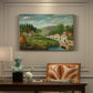 Canvas art print featuring a rural landscape with stream, walking figures, and fisherman near water, presented within a refined interior setting