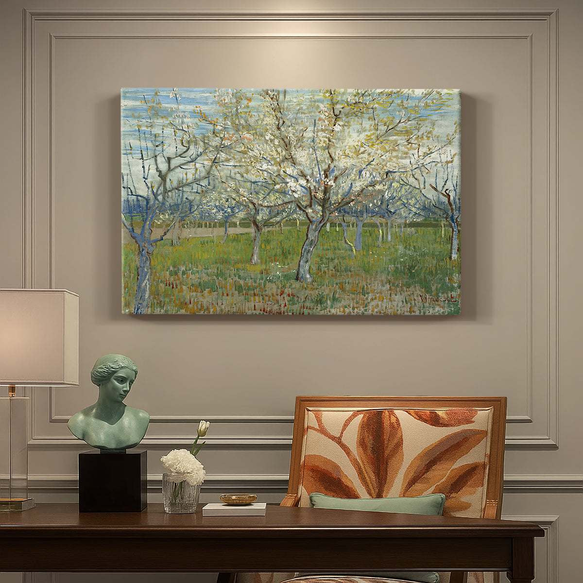 Canvas art print featuring an orchard in bloom with pink blossoms across soft landscape, presented within a refined interior setting