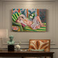 Canvas art print featuring a reclining odalisque surrounded by floral and magnolia patterns, presented within a refined interior setting