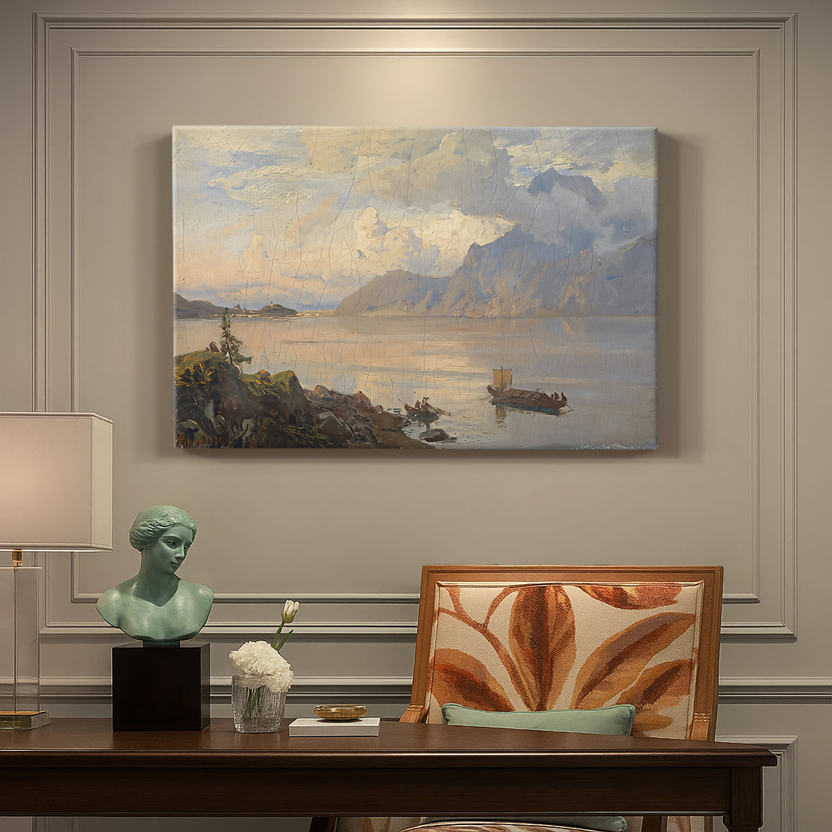 Canvas art print featuring a lake surrounded by mountains with boats on calm water, presented within a refined interior setting
