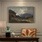 Canvas art print featuring a rugged Norwegian coastline with cliffs, water, and distant boats, presented within a refined interior setting