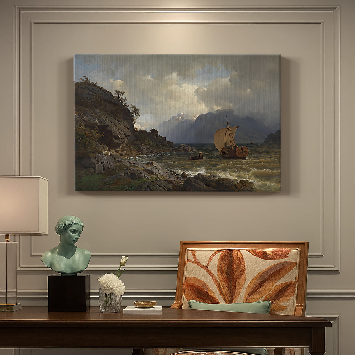 Canvas art print featuring a rugged Norwegian coastline with cliffs, water, and distant boats, presented within a refined interior setting