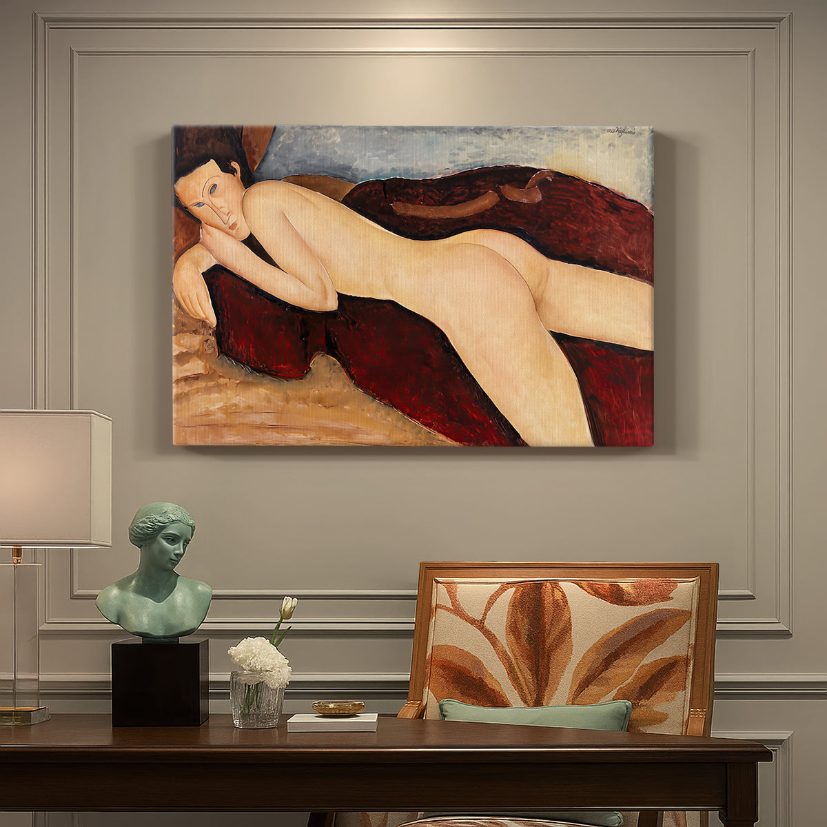Canvas art print featuring a nude woman reclining on her stomach viewed from behind with elongated back, presented within a refined interior setting