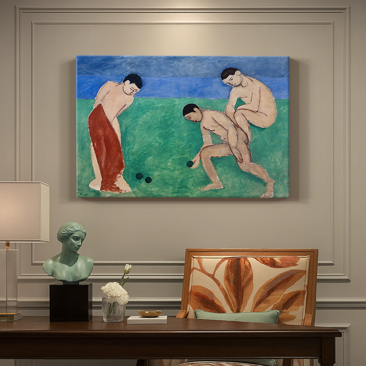 Canvas art print featuring figures playing bowls outdoors in a simplified colorful landscape, presented within a refined interior setting