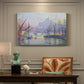 Canvas art print featuring a busy harbor filled with boats and waterfront, presented within a refined interior setting