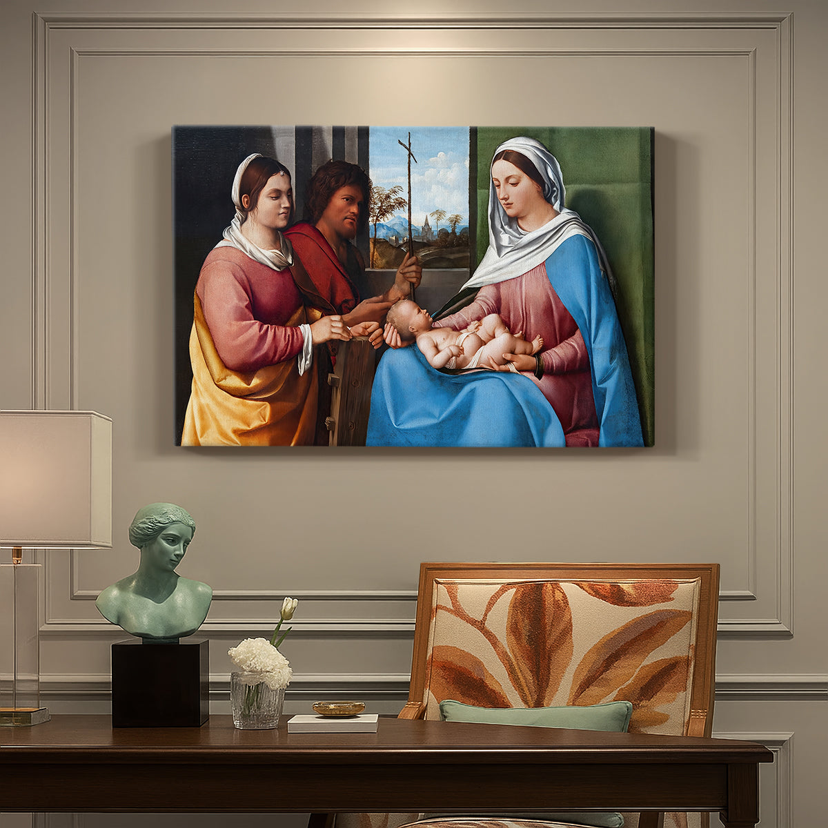 Canvas art print featuring a group of figures seated together in calm religious setting with soft landscape background, presented within a refined interior setting