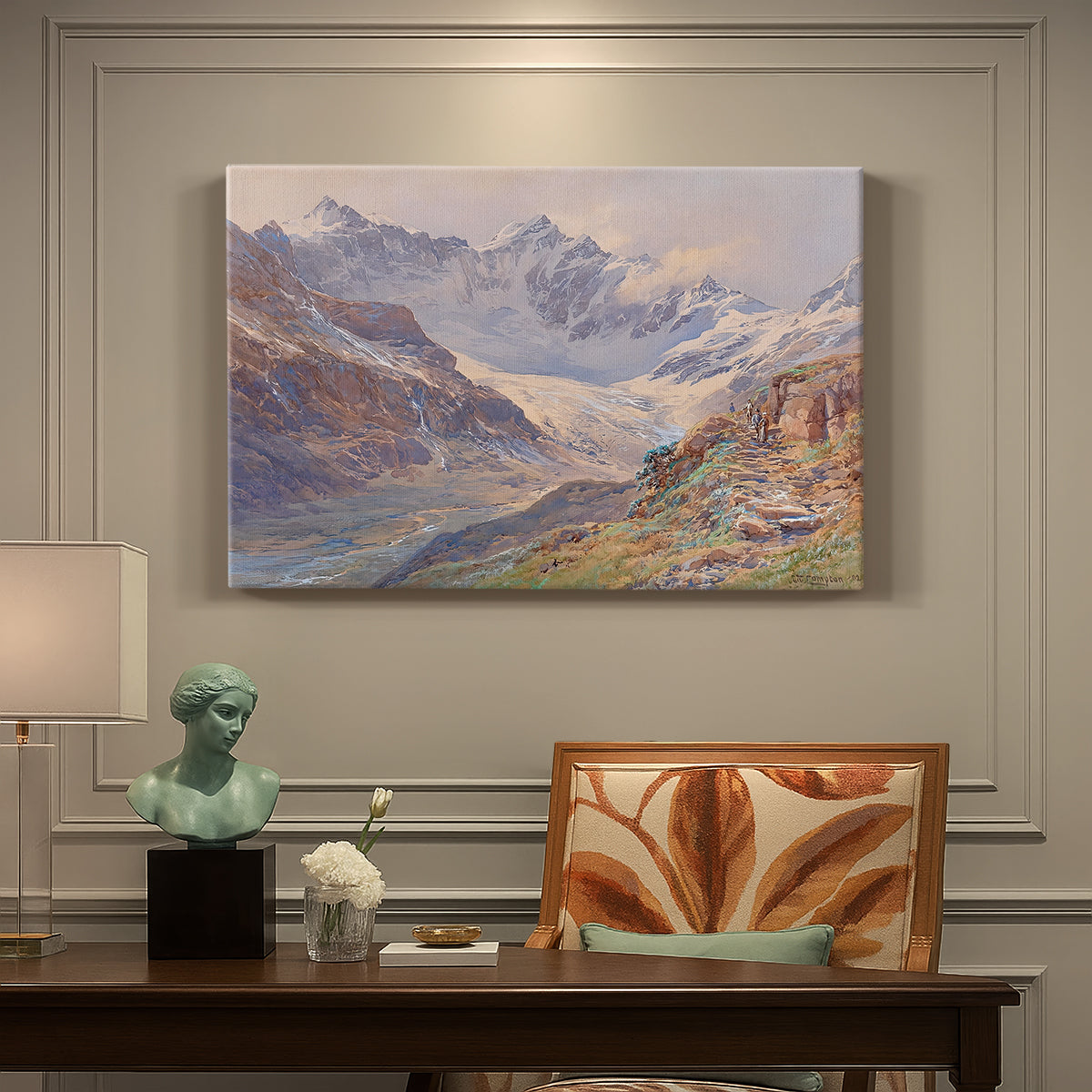 Canvas art print featuring an alpine glacier landscape with rugged peaks and snow-covered terrain, presented within a refined interior setting