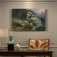 Canvas art print featuring eagles attacking stag near lake, presented within a refined interior setting