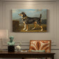 Canvas art print featuring a small terrier standing alert in open countryside landscape, presented within a refined interior setting