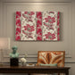 Canvas art print featuring a repeating pattern with floral arrangements emerging from horn-shaped forms, presented within a refined interior setting