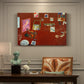 Canvas art print featuring a red studio interior with furniture and artworks, presented within a refined interior setting