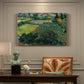 Canvas art print featuring a field dotted with red poppies under bright sky and rolling terrain, presented within a refined interior setting