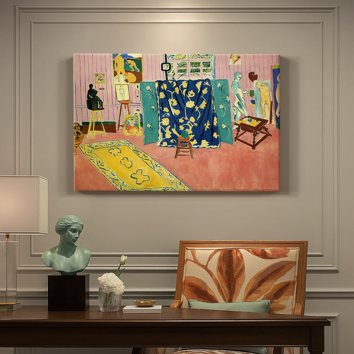 Canvas art print featuring a studio interior filled with objects in pink tones, presented within a refined interior setting