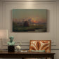 Canvas art print featuring a haystack in field under warm sunset sky, presented within a refined interior setting