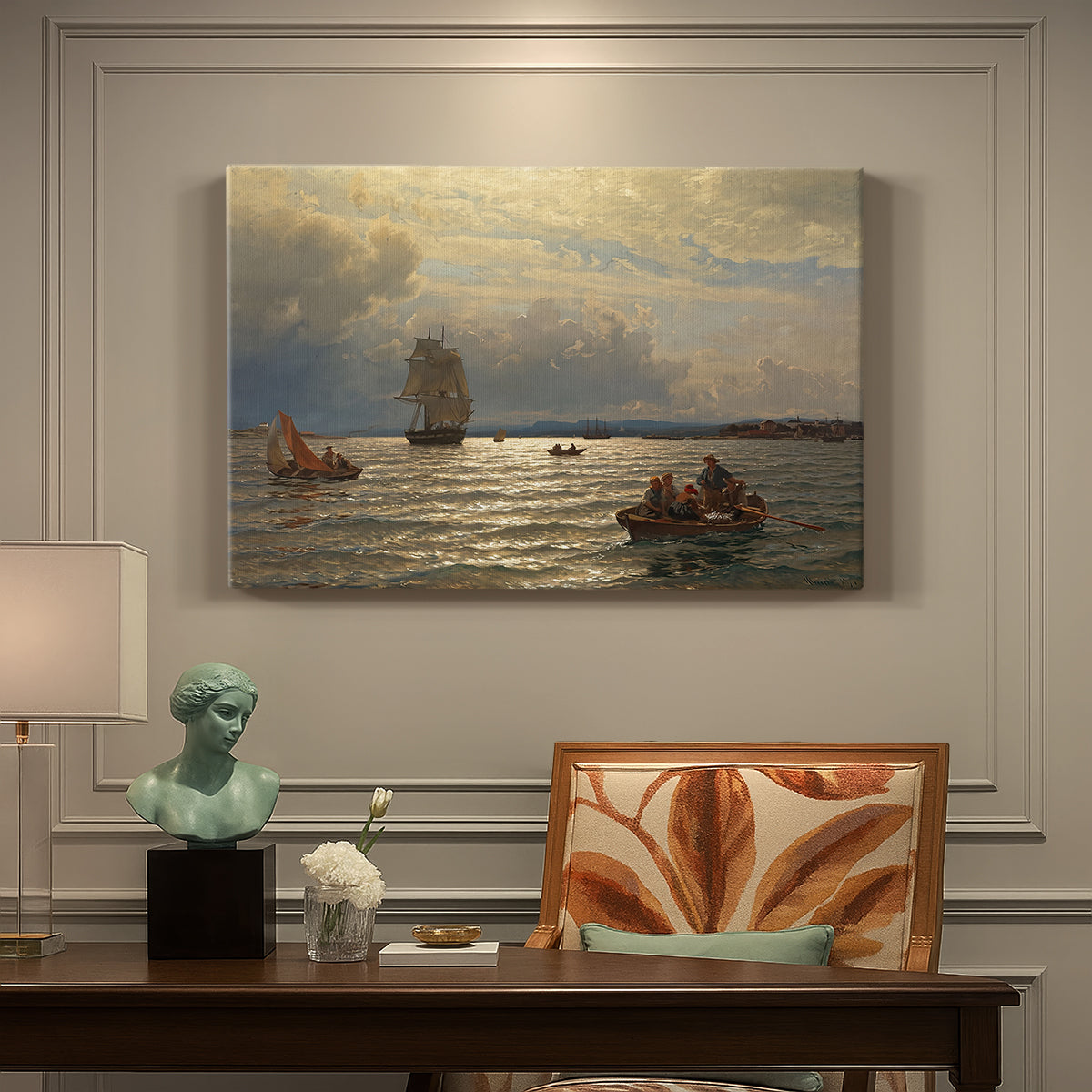 Canvas art print featuring a calm water inlet with boats and distant shoreline under soft light, presented within a refined interior setting