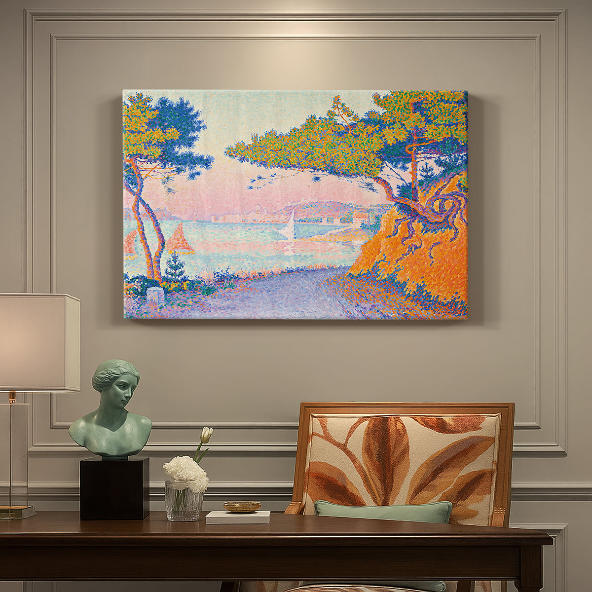 Canvas art print featuring a coastal landscape with trees and water, presented within a refined interior setting