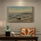 Canvas art print featuring a stormy coastal scene with waves crashing under dark dramatic sky, presented within a refined interior setting