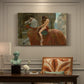 Canvas art print featuring a female figure riding horse through town, presented within a refined interior setting