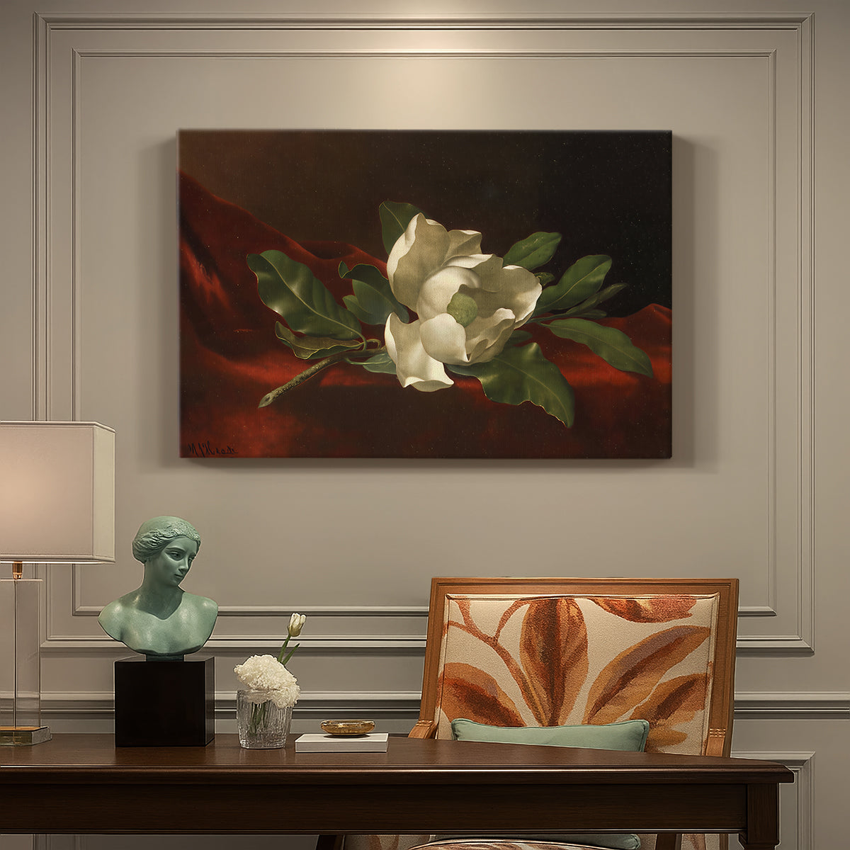 Canvas art print featuring a white magnolia bloom resting on red velvet surface, presented within a refined interior setting