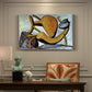 Canvas art print featuring an abstract cat interacting with large fish in simplified form, presented within a refined interior setting