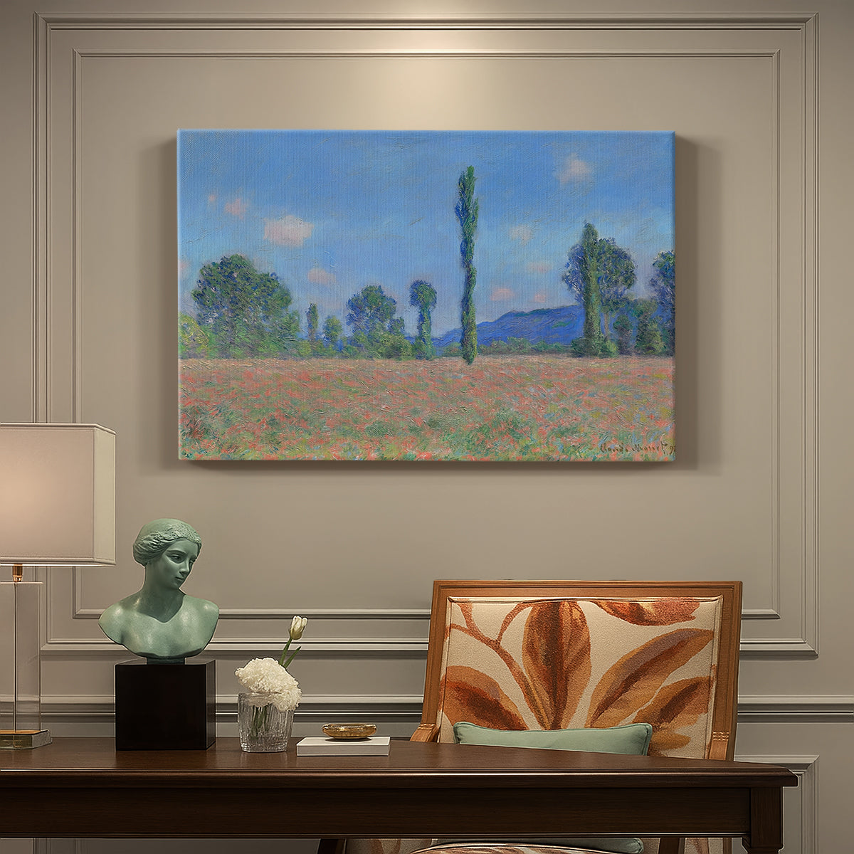 Canvas art print featuring an expansive field of red poppies with tall trees under blue sky, presented within a refined interior setting