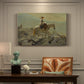 Canvas art print featuring a rider on horseback moving along elevated path with mountain view, presented within a refined interior setting