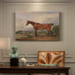 Canvas art print featuring a mounted hunter with dog in open rural landscape, presented within a refined interior setting