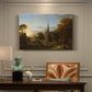 Canvas art print featuring figures approaching settlement within expansive landscape under warm light, presented within a refined interior setting
