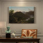 Canvas art print featuring a mountain valley at sunrise with light spreading across trees and hills, presented within a refined interior setting