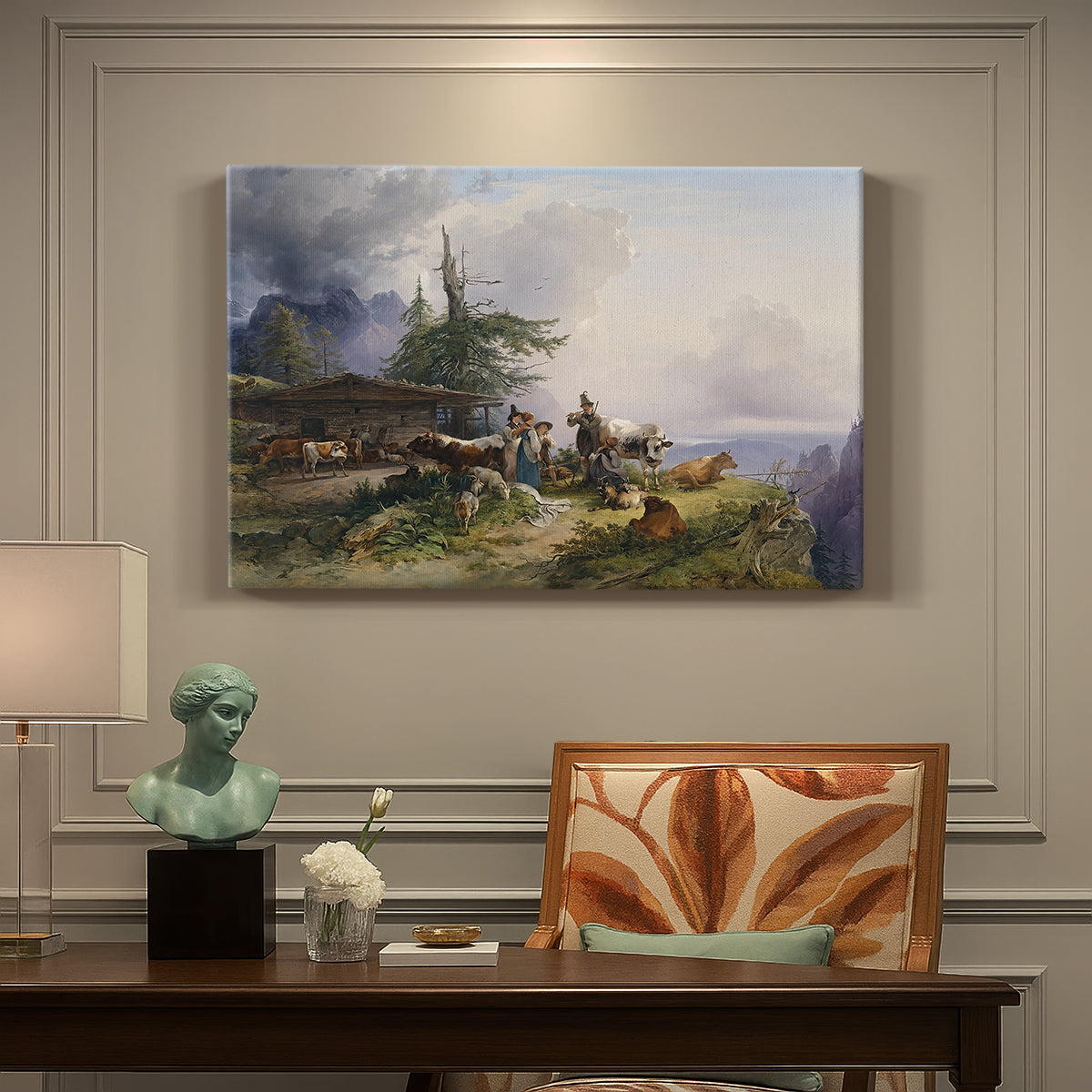 Canvas art print featuring a farmhouse with livestock set within mountainous alpine landscape, presented within a refined interior setting