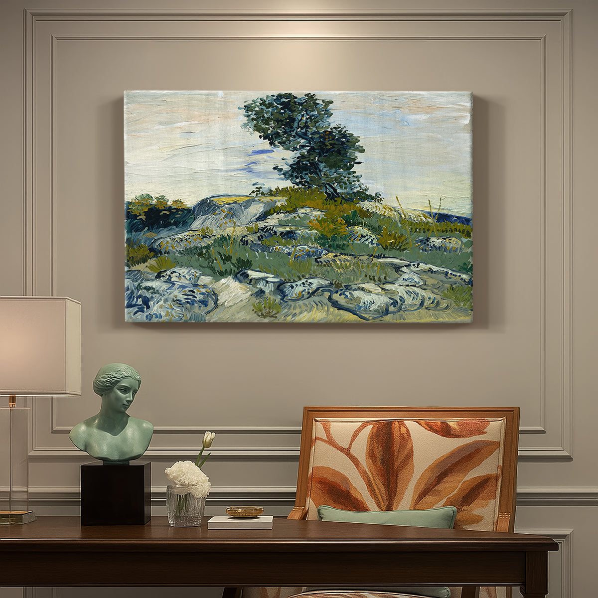 Canvas art print featuring a rocky terrain with natural formations and sparse vegetation under sky, presented within a refined interior setting