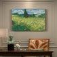 Canvas art print featuring a wheat field with tall cypress tree rising against vivid sky, presented within a refined interior setting