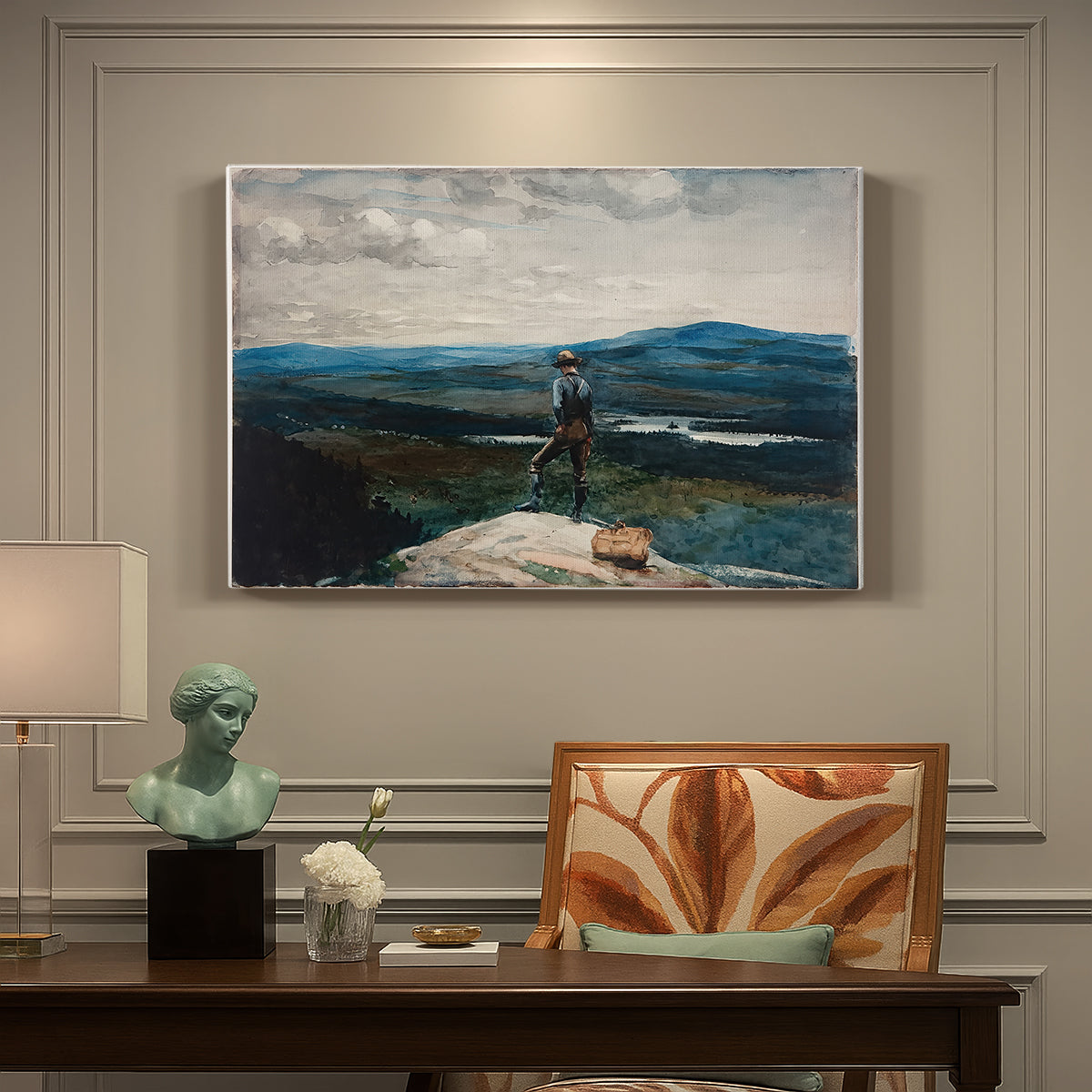 Canvas art print featuring a figure standing in small boat on open water with distant hills behind, presented within a refined interior setting