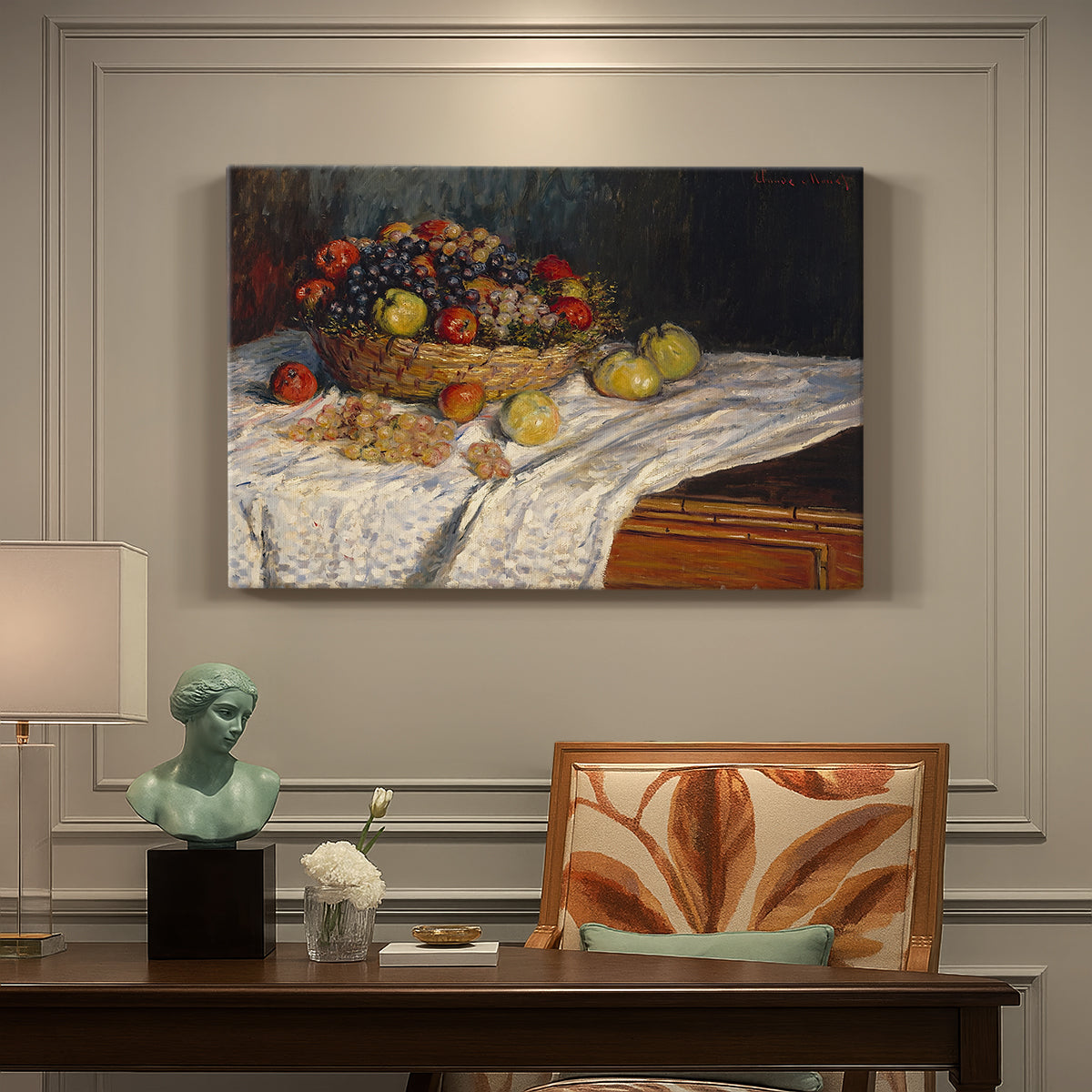 Canvas art print featuring an arrangement of apples and grapes on table with soft natural light, presented within a refined interior setting