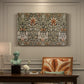 Canvas art print featuring a repeating floral pattern with dark background and warm-toned plant forms, presented within a refined interior setting