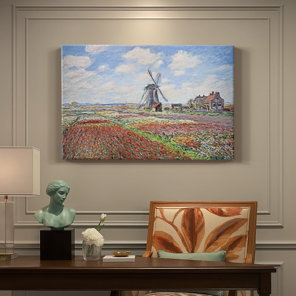 Canvas art print featuring colorful rows of tulip fields leading toward distant windmill, presented within a refined interior setting