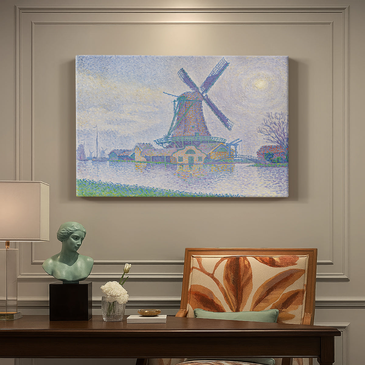 Canvas art print featuring a windmill beside water in quiet town landscape, presented within a refined interior setting