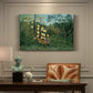 Canvas art print featuring a tiger attacking buffalo in dense jungle filled with foliage, presented within a refined interior setting