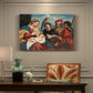 Canvas art print featuring a group of holy figures gathered around Madonna and child in colorful composition, presented within a refined interior setting