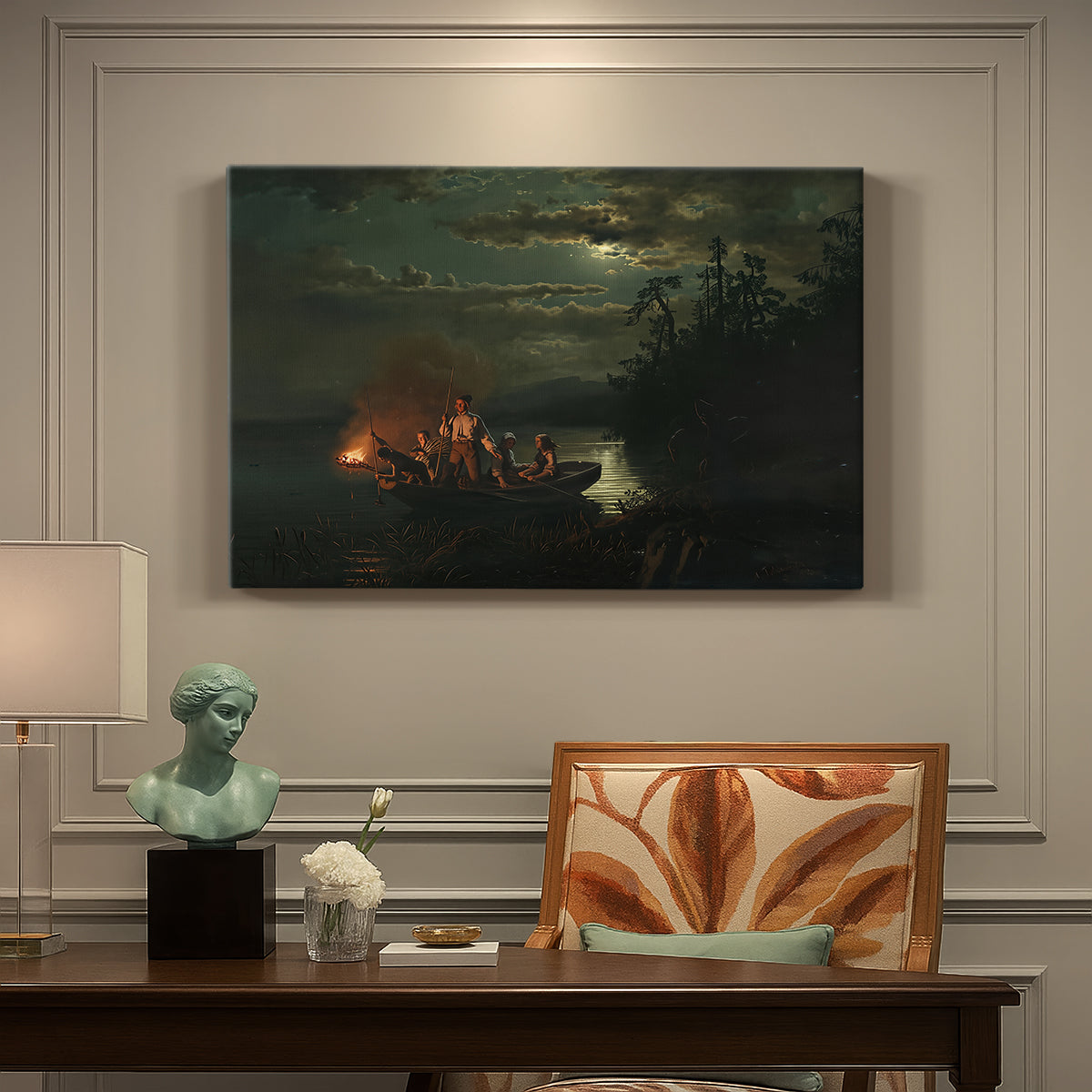 Canvas art print featuring figures fishing with spears from boat on calm lake at dusk, presented within a refined interior setting